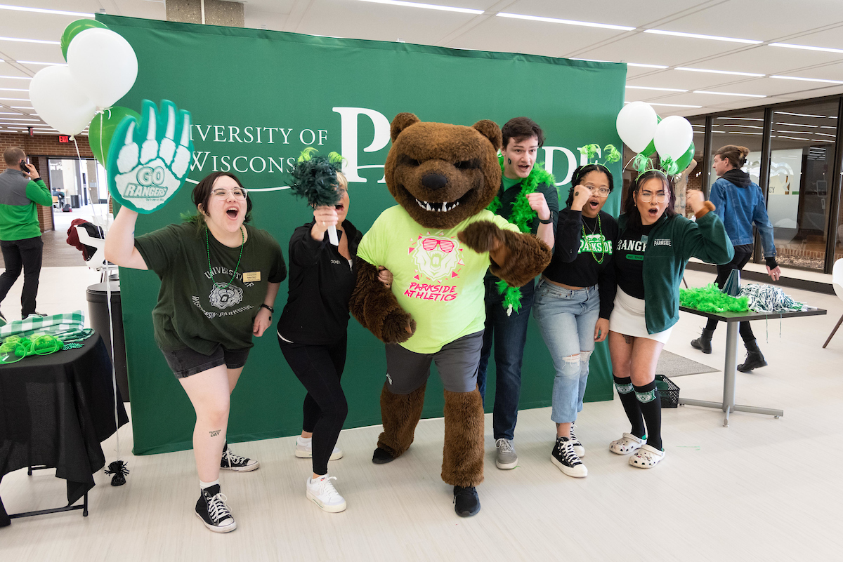 Ranger Bear with students at the Parkside Day Celebration