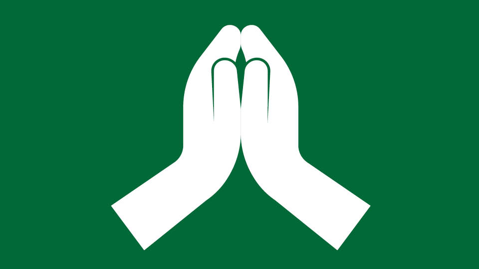 white icon on green background meditation hands