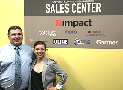 image of two sales team students