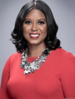 JasmineJohnsonHeadshot Black woman, redshirt, large necklace