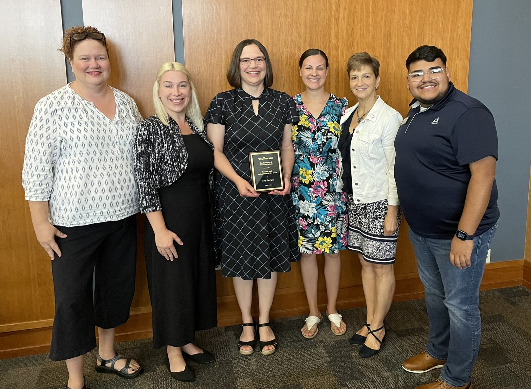 CBE Team at Convocation 2024, celebrating Amy Garrigan&#39;s Distinguished Academic Staff Award