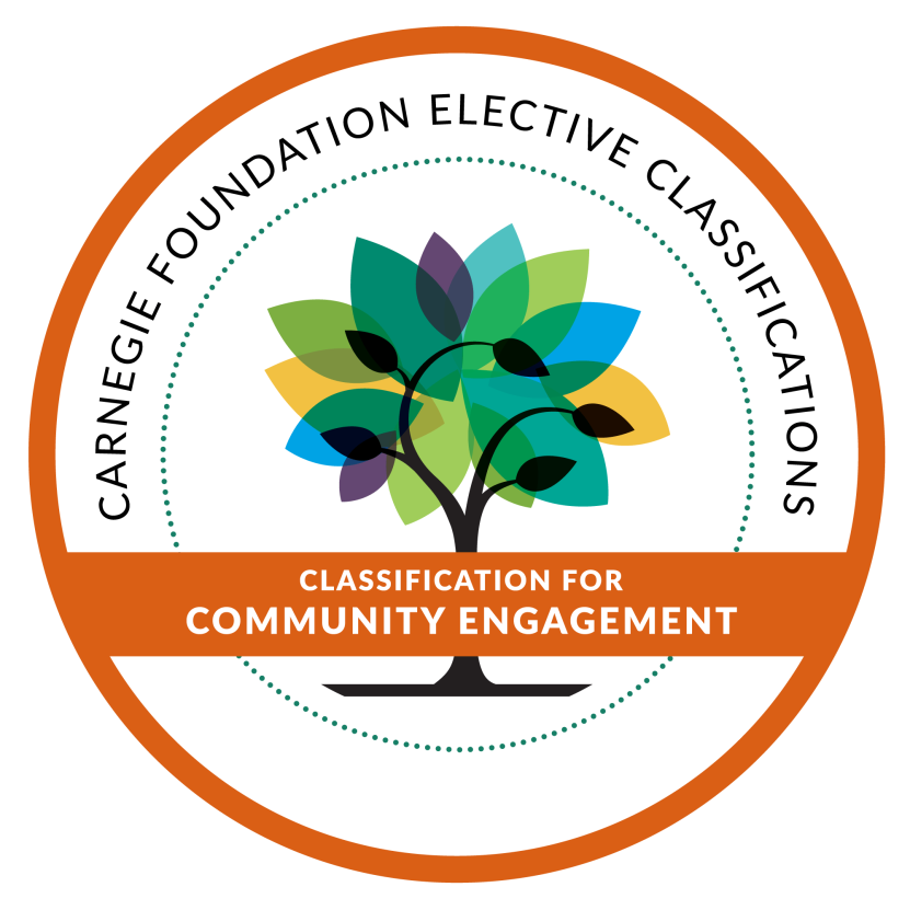 Round seal with orange border and colorful leaves on a tree to denote UW-Parkside's Classification for Community Engagement from the Carnegie Foundation
