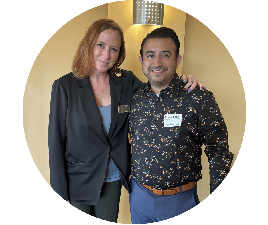 Photo Outstanding Partnership Award Winners, Aubri McDonald and Tony Chavez standing side by side at the Community Partnership Celebration in 2025