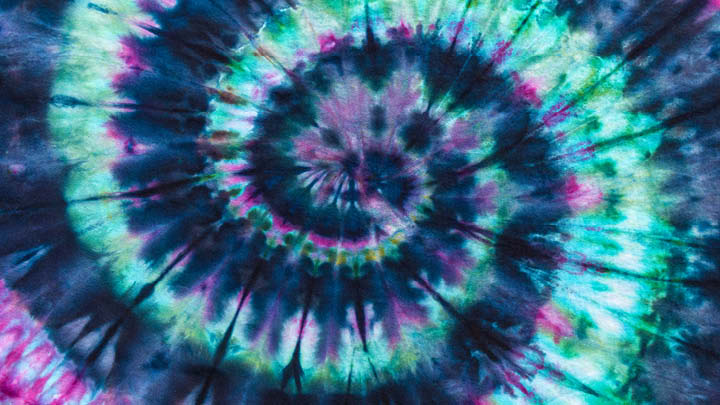 decorative image of green and blue spiral tie-dye