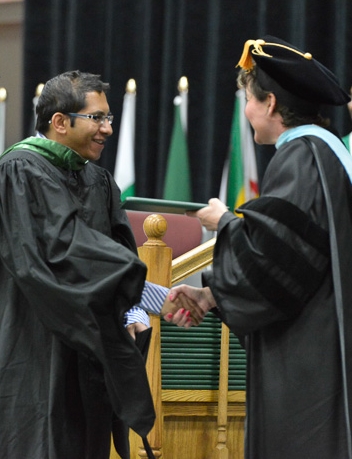 Chancellor Ford with Graduate