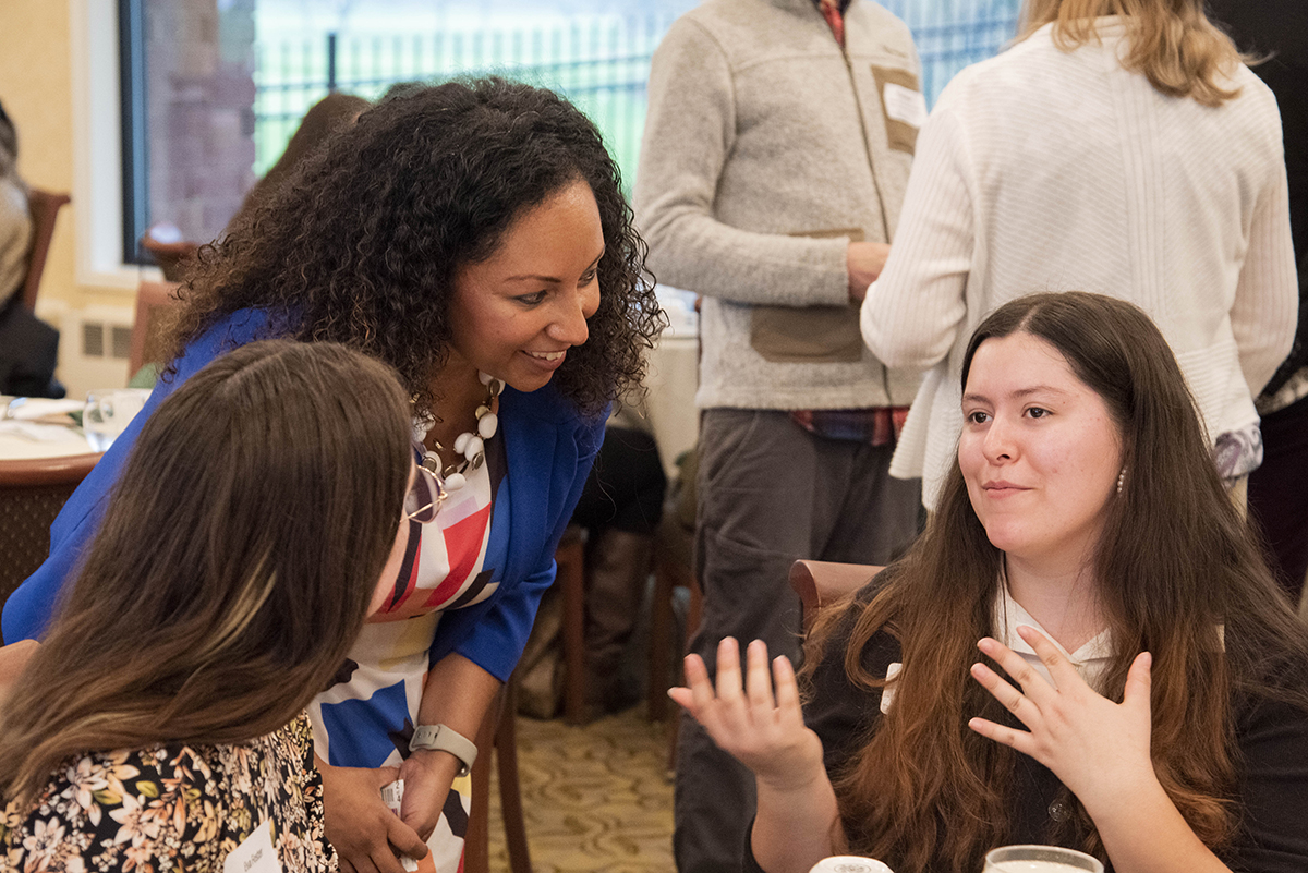 Keynote speaker Deanna Singh speaks with students