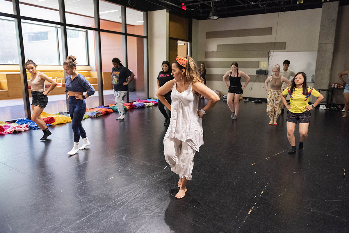Students learn Bomba Sica' with dance instructor Karlies Kelly