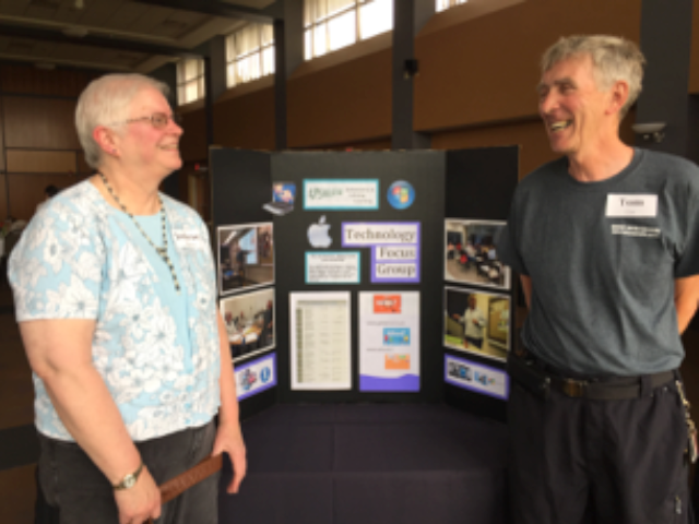 Leaders of the Technology focus group at ALL’s annual meeting, displaying information about the tech review meetings, attended by about 30 people each month. 