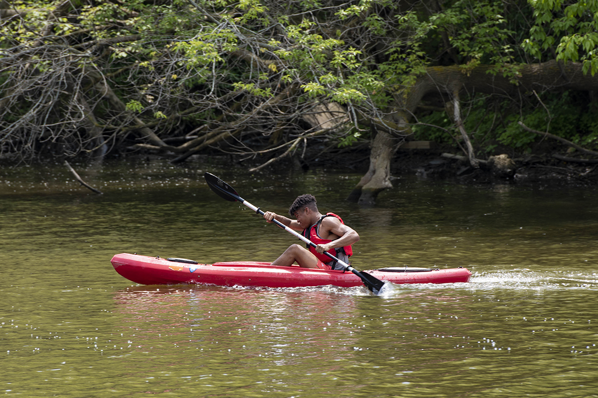Adam Turner kayaking on the Root River
