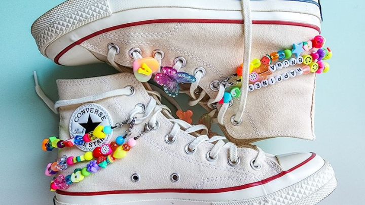 Pair of shoes with beads on them.