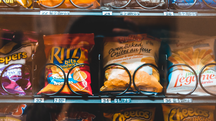Photo of bags of chips in a vending machine.