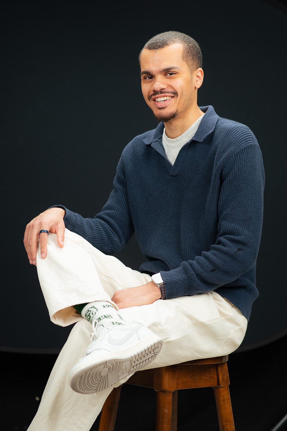 photo of Chris Davis with leg crossed showing of the Parkside Day sock design