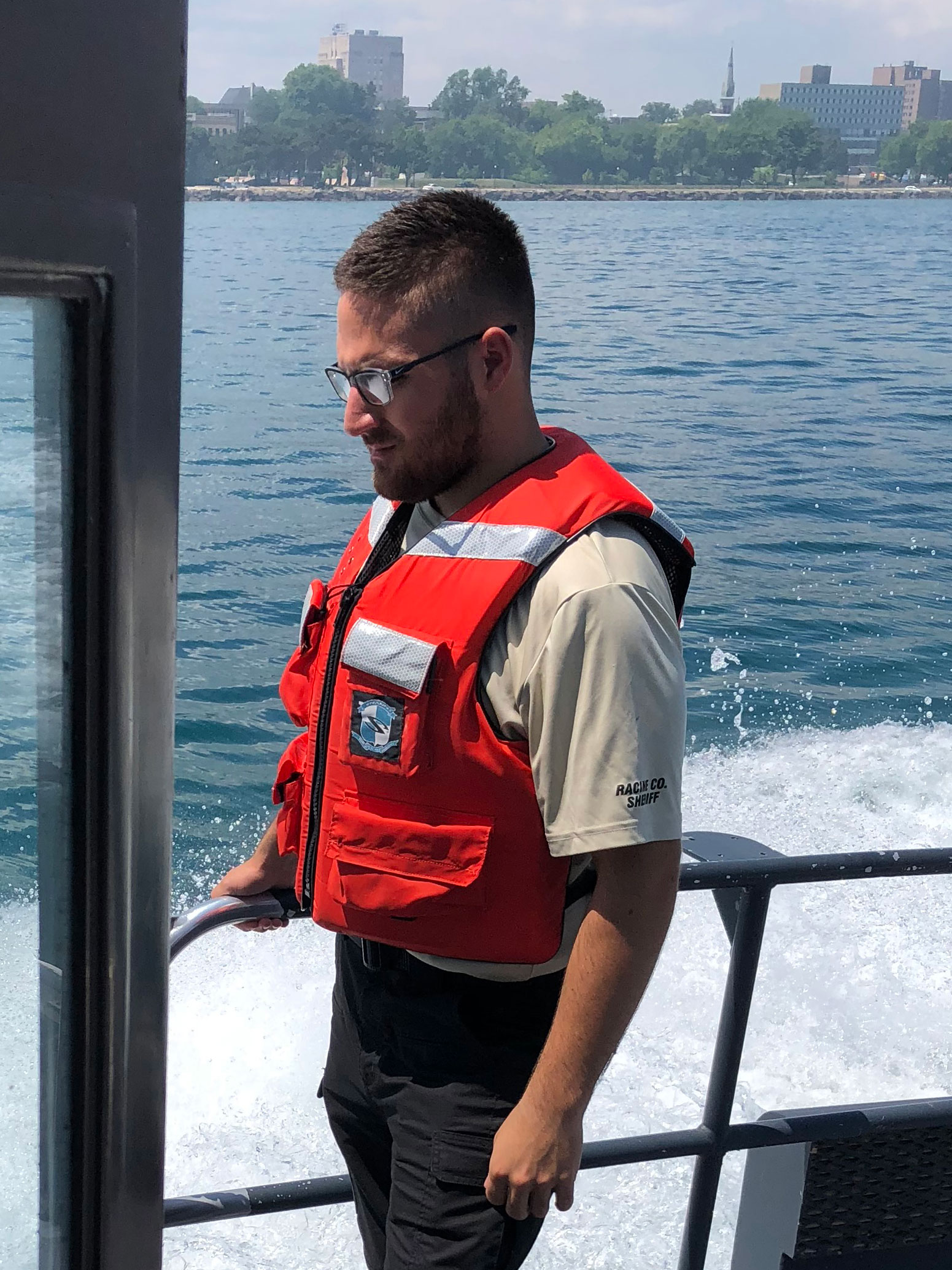 image of intern on a water patrol boat