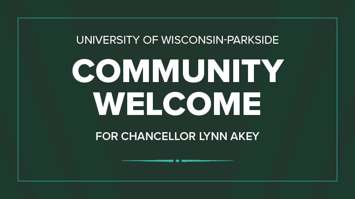 dark green background with text, community welcome for chancellor Lynn Akey