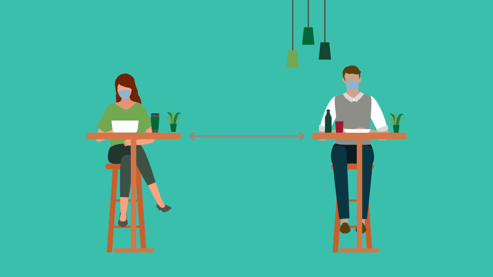 Dining Image of a man and woman at separate tables dining at a safe distance