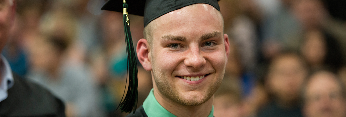 Jake Hansen at commencement - wide image