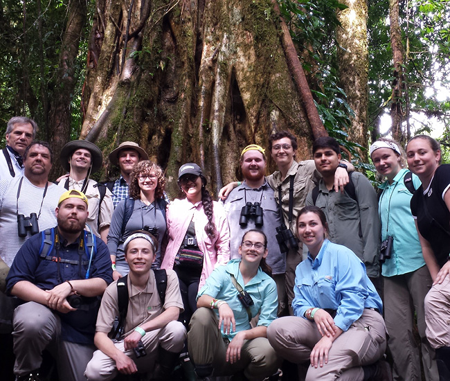 Parkside’s young naturalists (and a couple of old ones) in front of a strangler fig in the cloud forest at Monteverde Cloud Forest Reserve. 