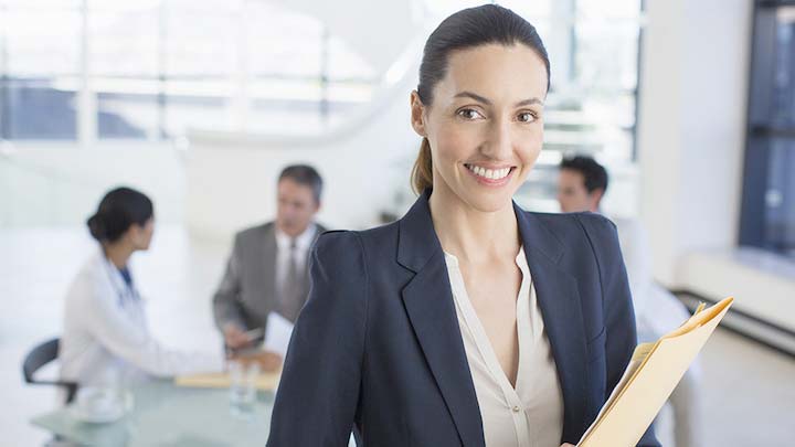 Lady Smiling with Folder