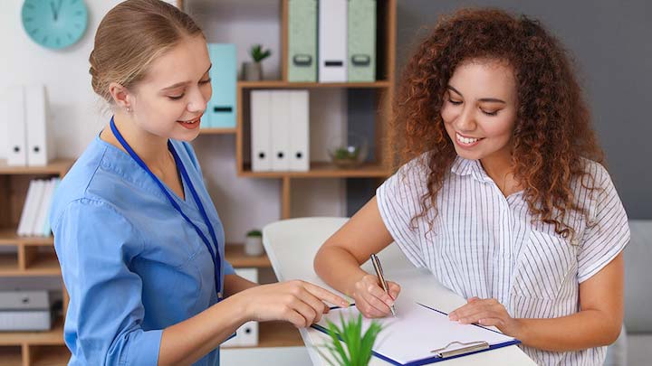 Smiling Ladies Working Together