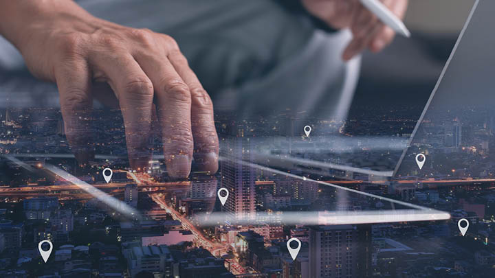 image of computer and 3D map location points