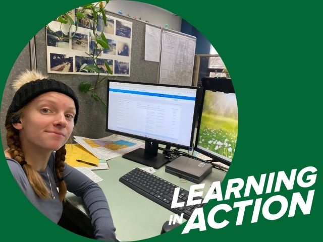 Learning in action photo for UW-Parkside Student Kalista Butkiewicz at desk for Community-based learning experience with Hawthorn Hollow