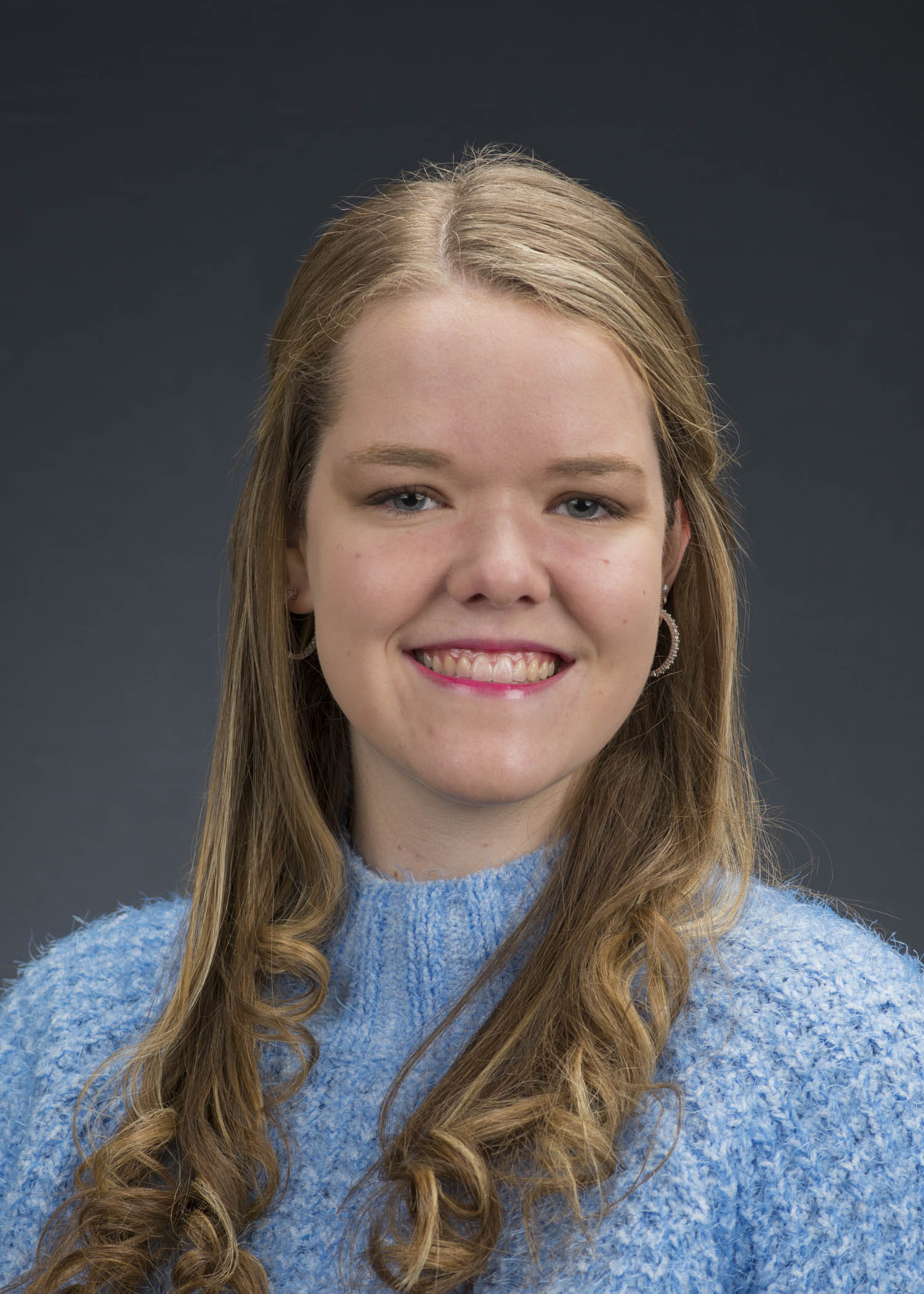 Vertical headshot of Carly Legner