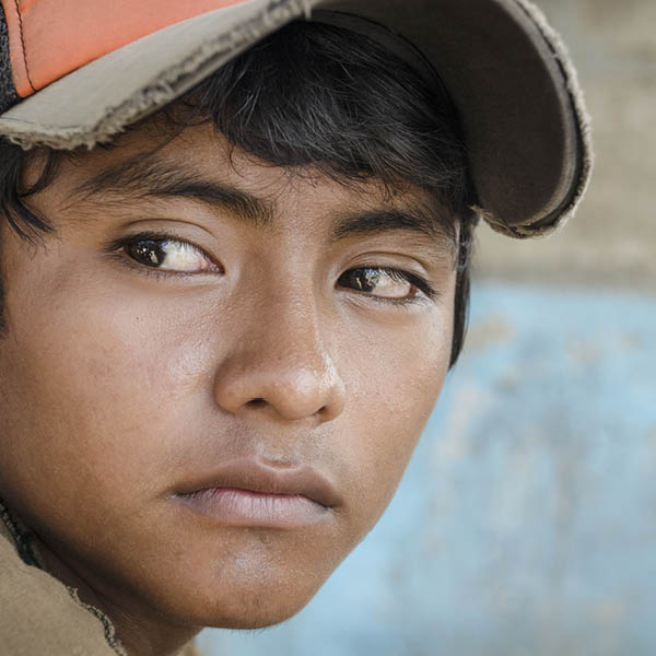 Imm 4.10.18 600x600 hispanic boy with hat and blue background