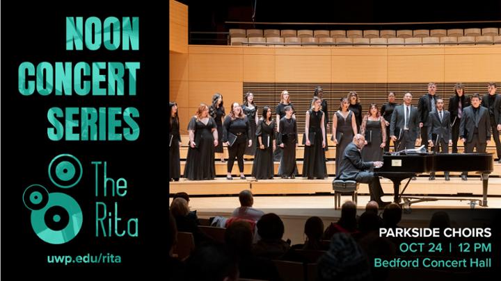 A large choir on the Bedford Hall stage with the conductor center stage on the piano. The text reads &quot;Noon Concert Series, Parkside Choirs, October 24 at 12pm, Bedford Concert Hall&quot;