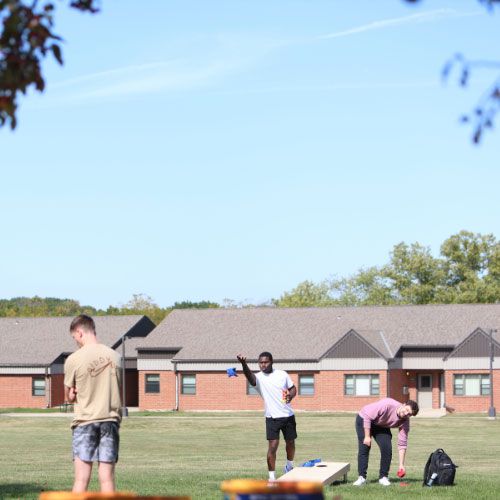Students playing bags during Parkside Rocks.