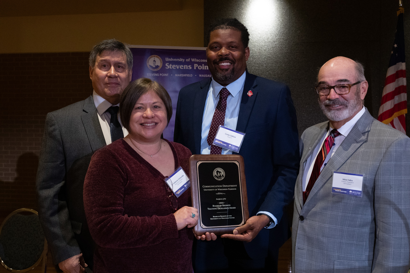 Dr. Viramontes accepts award on behalf of UW-Parkside Communication Department; pictured with Regent President Manydeeds, Regent Corey Saffold, and Interim President Falbo