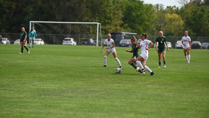 Athletes playing soccer